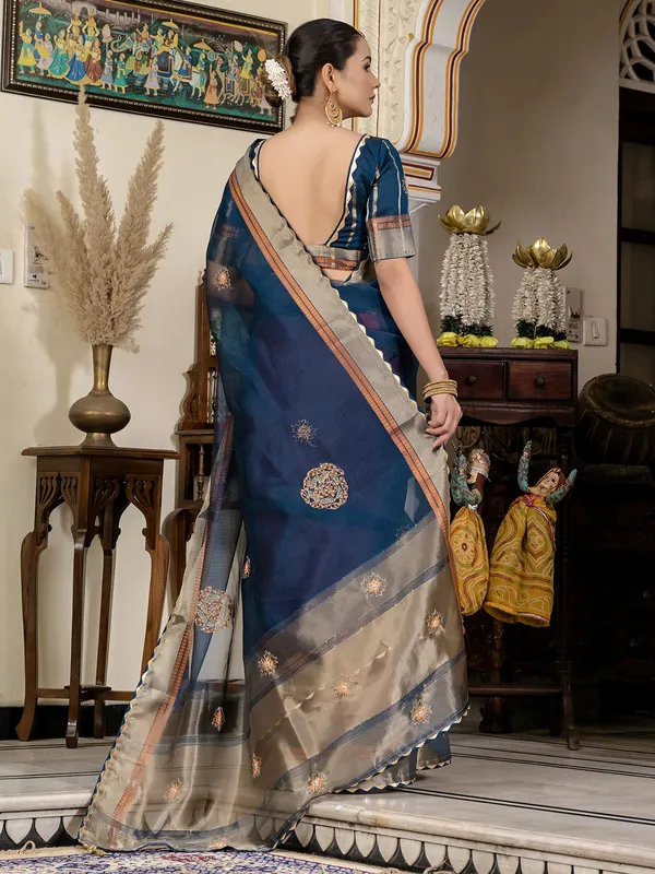 Rama blue linen saree with elegant zari weaving