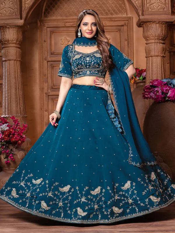 Rama blue raw silk lehenga choli with elegance
