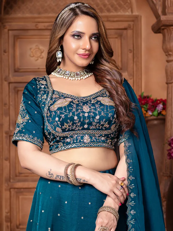 Rama blue raw silk lehenga choli with elegance