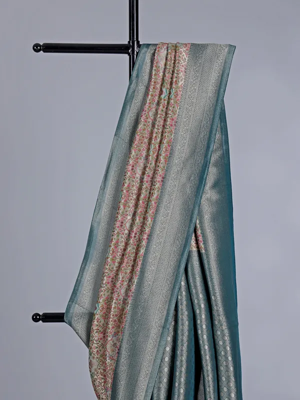 Rama blue shimmer dola silk saree with floral detailing