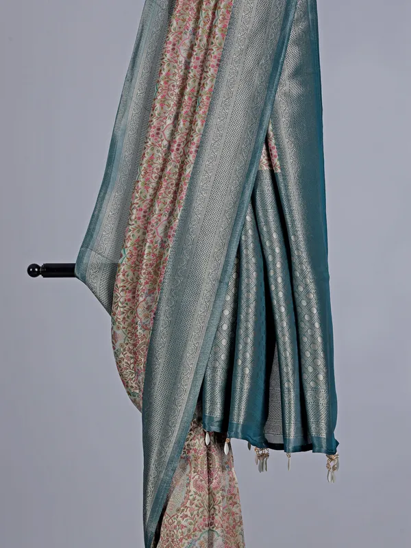Rama blue shimmer dola silk saree with floral detailing