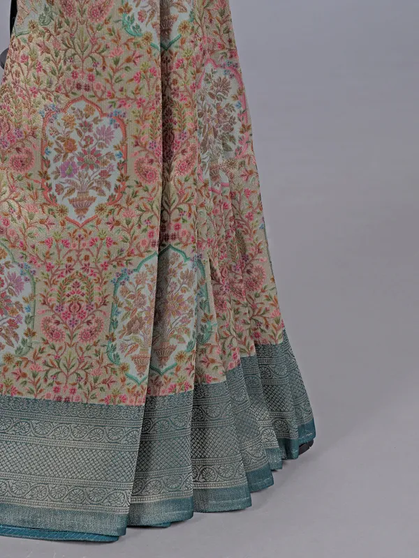 Rama blue shimmer dola silk saree with floral detailing