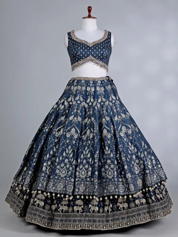Rama blue silk bridal lehenga choli with pearls work