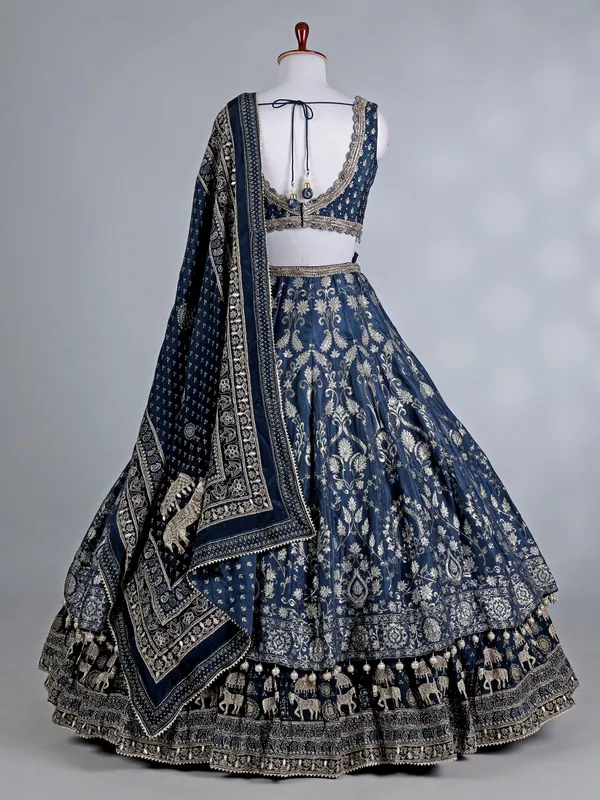 Rama blue silk bridal lehenga choli with pearls work