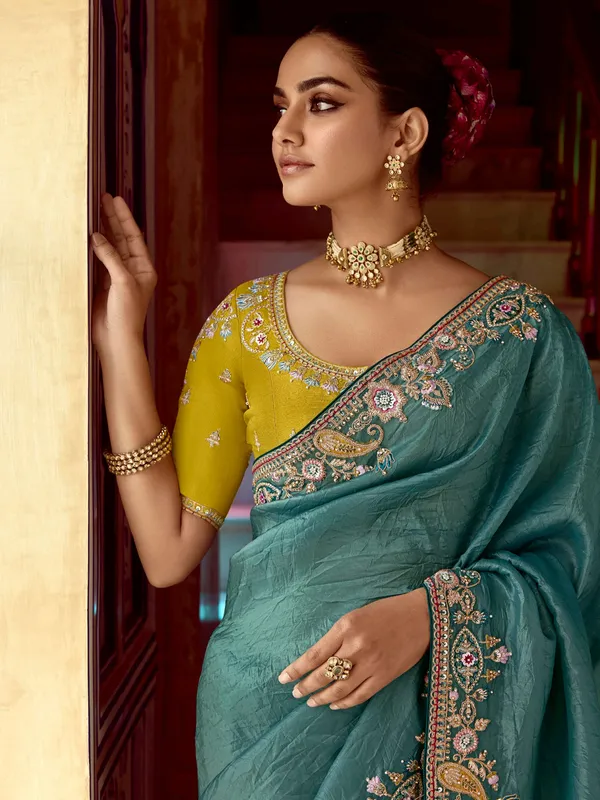 Rama blue tissue silk saree with resham details
