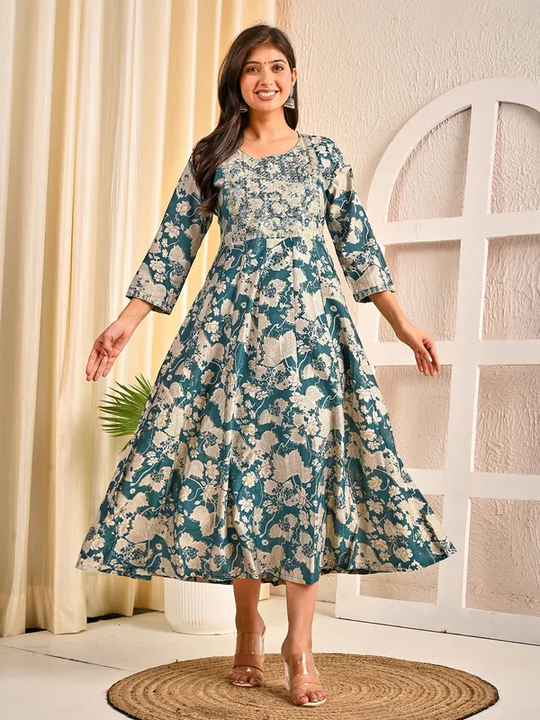 Rama green cotton silk embroidered kurti