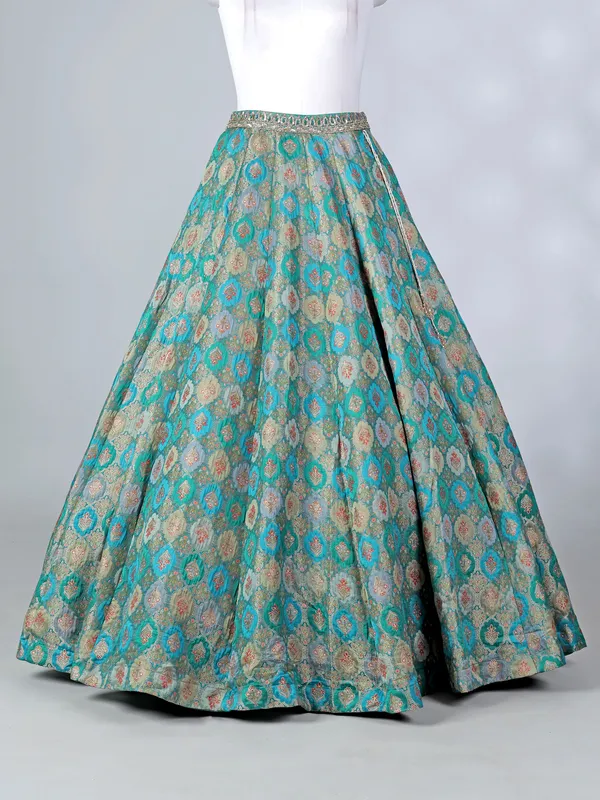 Rama green lehenga choli with colorful motifs