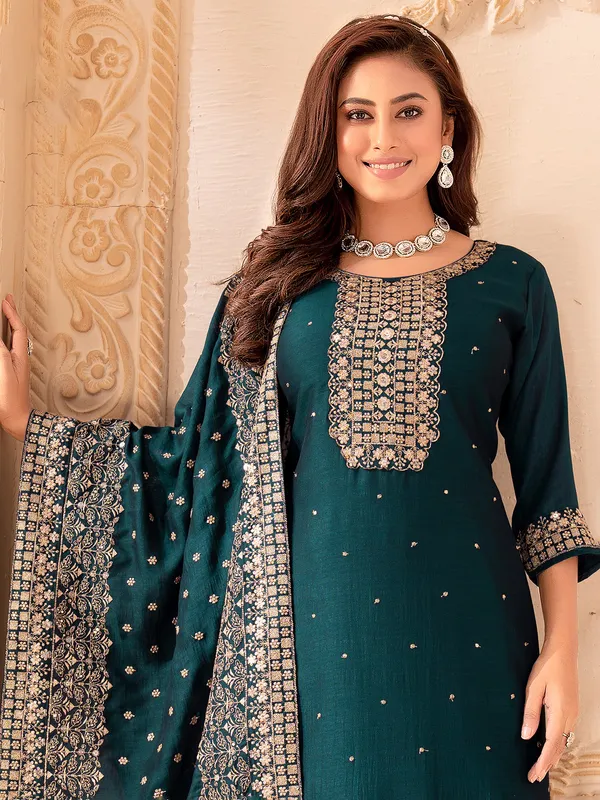 Rama green silk salwar suit with sequins work
