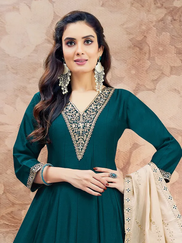 Rama green silk salwar suit with shimmering sequins work