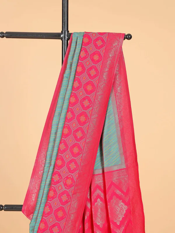 Rama green silk saree with magenta border