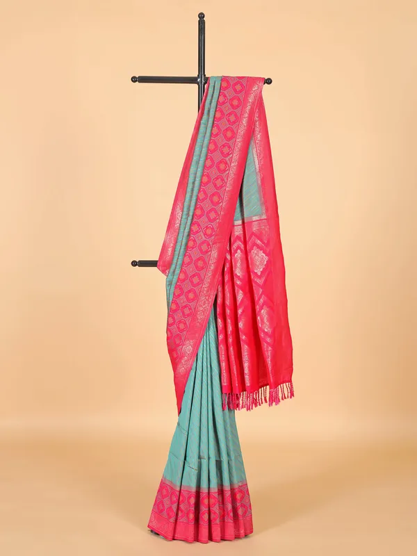 Rama green silk saree with magenta border
