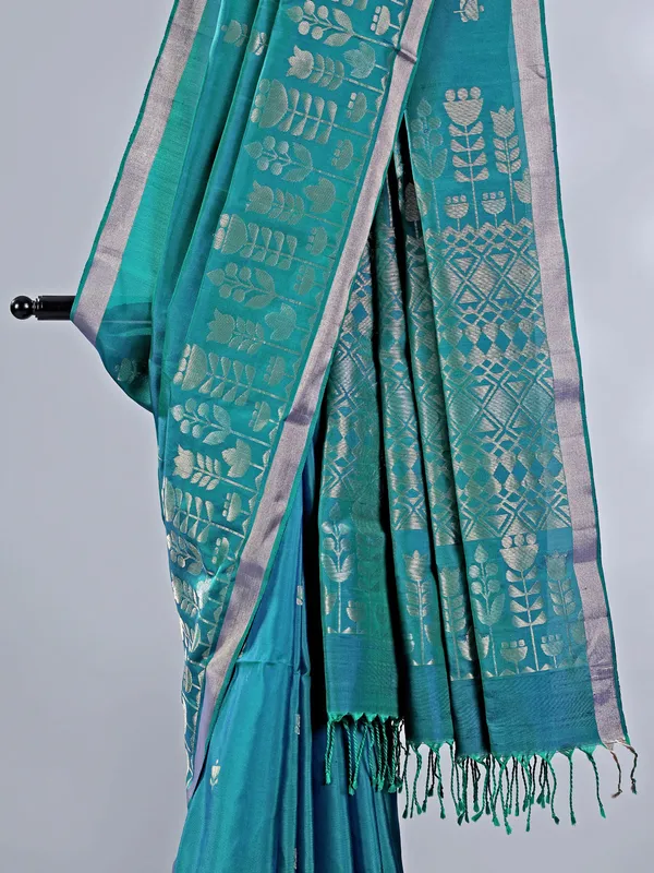 Rama green silk saree with rich zari embellishment
