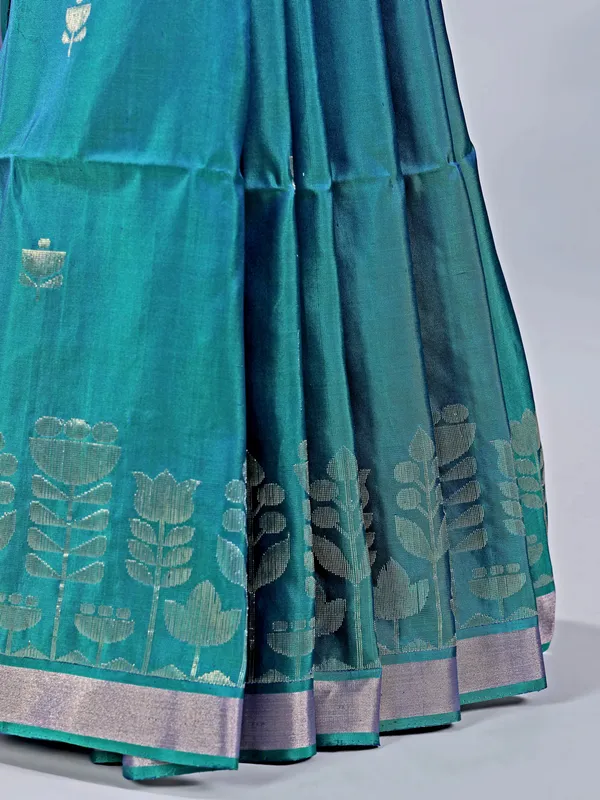 Rama green silk saree with rich zari embellishment