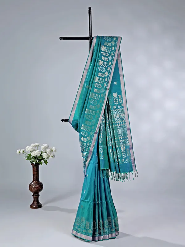 Rama green silk saree with rich zari embellishment