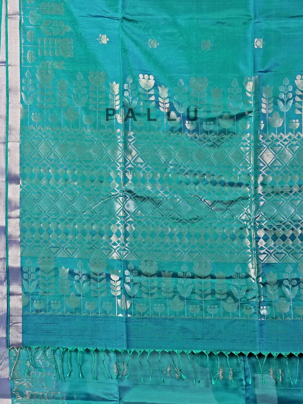 Rama green silk saree with rich zari embellishment
