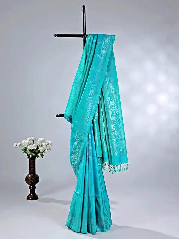 Rama green silk saree with traditional zari work