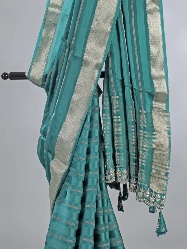 Rama green silk saree with zardosi and pearls
