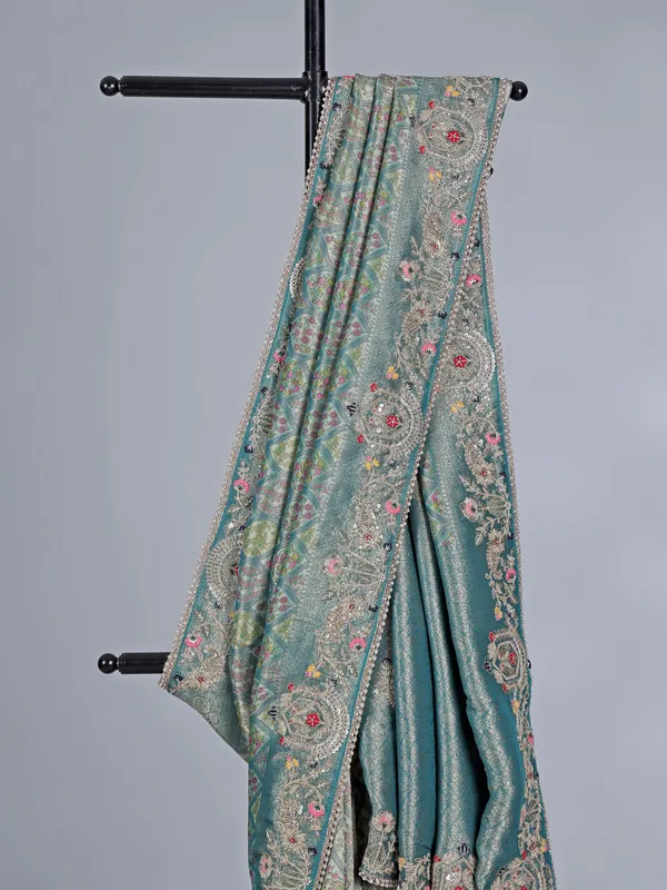 Rama green tissue silk festive wear saree with beads detailing