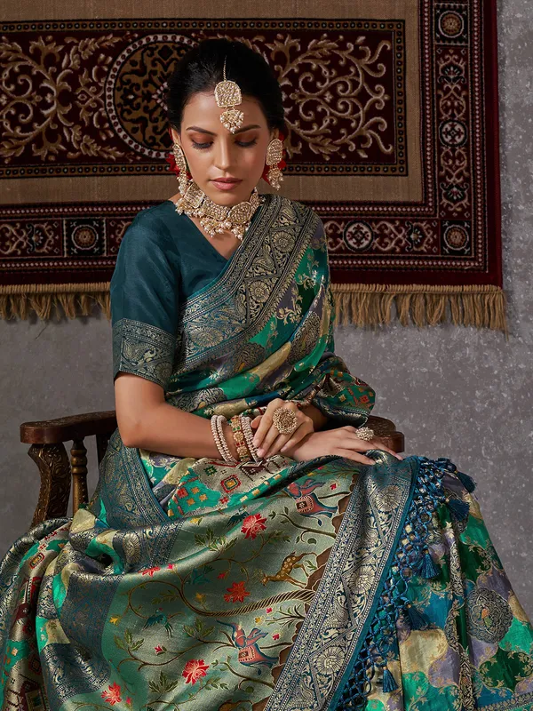 Rama green zari woven minakari saree