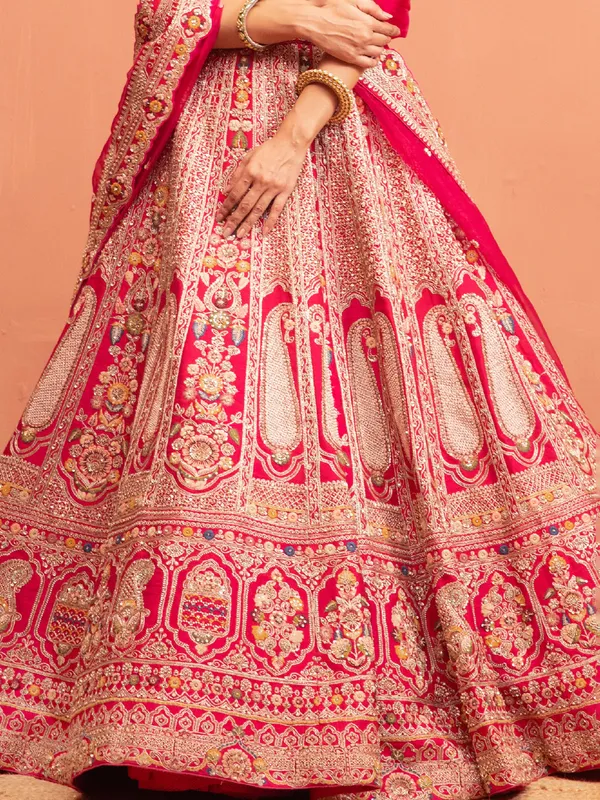 Rani bridal lehenga choli in raw silk fabric