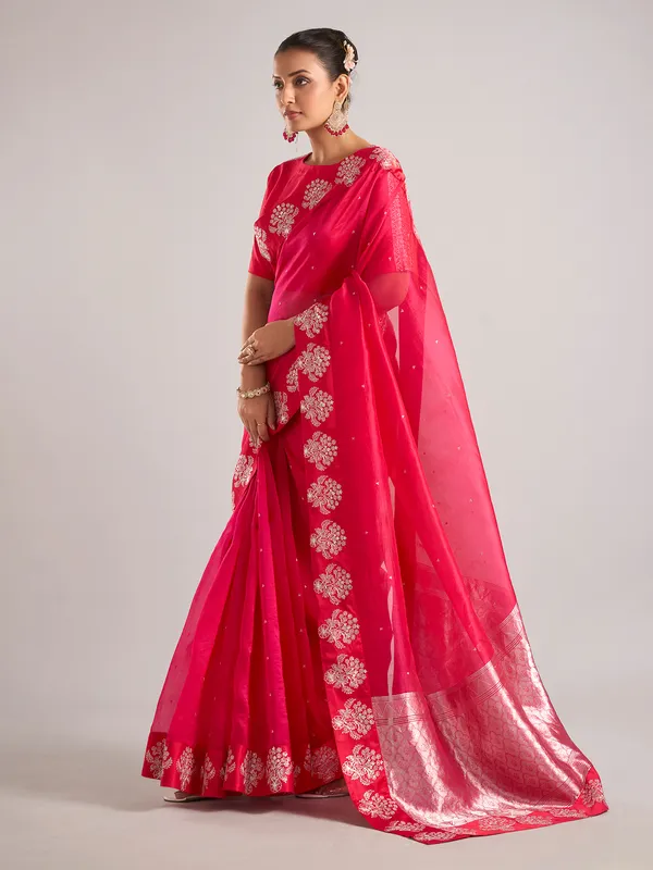 Rani color organza saree with ready made blouse