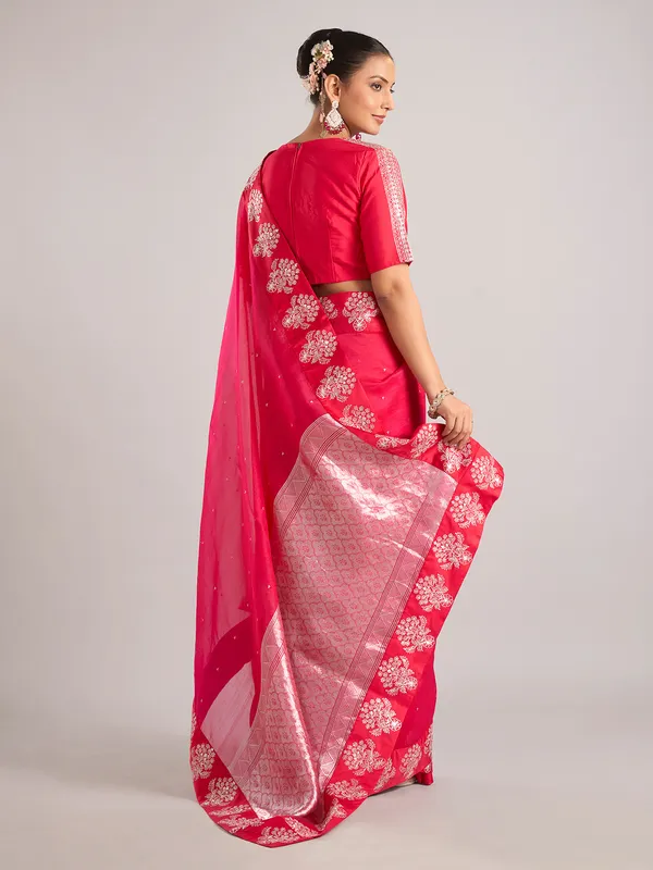Rani color organza saree with ready made blouse