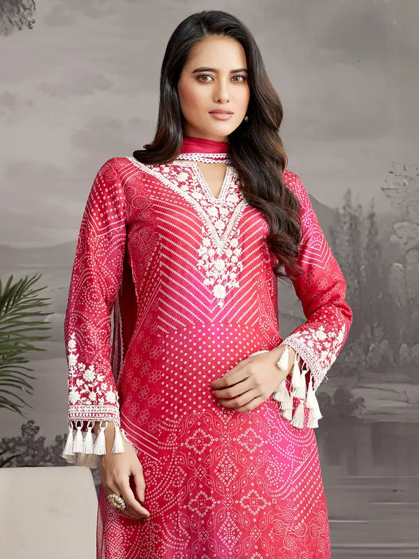 Rani color printed silk salwar suit with dupatta