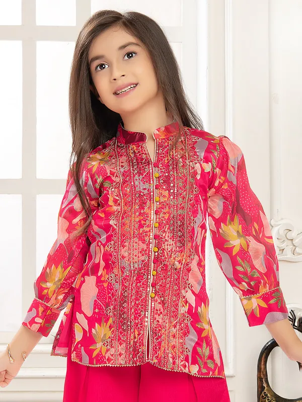 Rani color printed silk suit with resham work