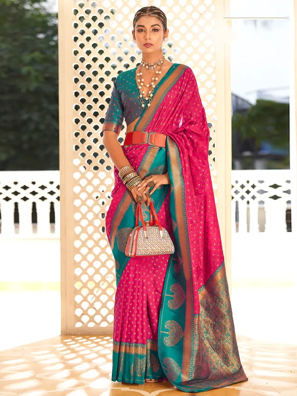 Rani color saree with contrast border for wedding