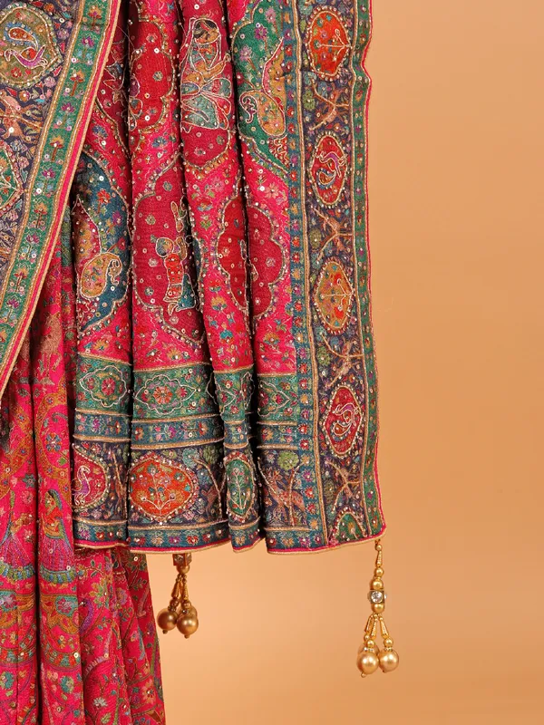 Rani color semi pashmina saree for wedding wear