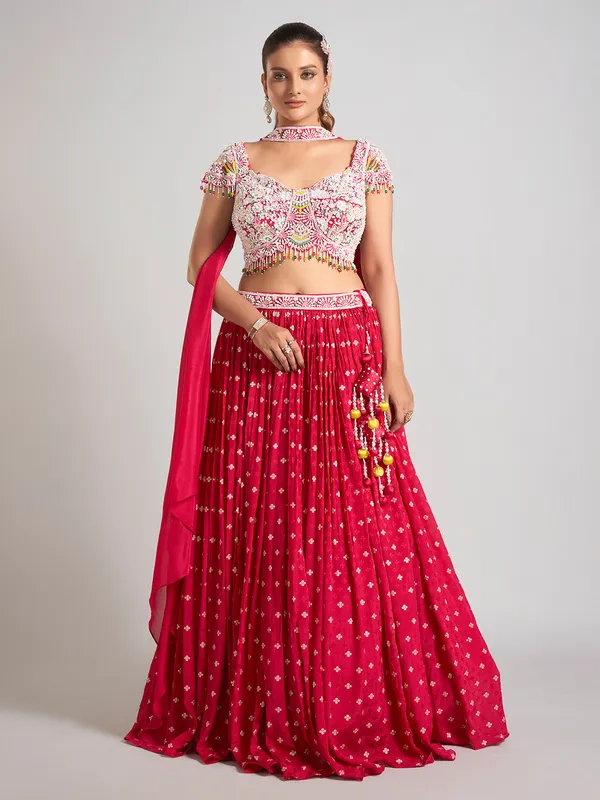 Rani color silk pearl embellished lehenga choli