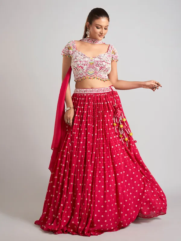Rani color silk pearl embellished lehenga choli