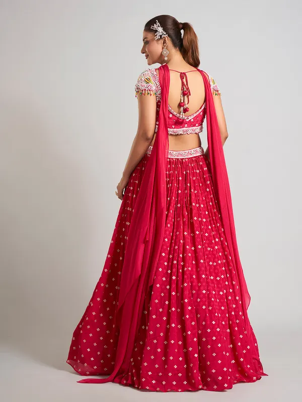 Rani color silk pearl embellished lehenga choli