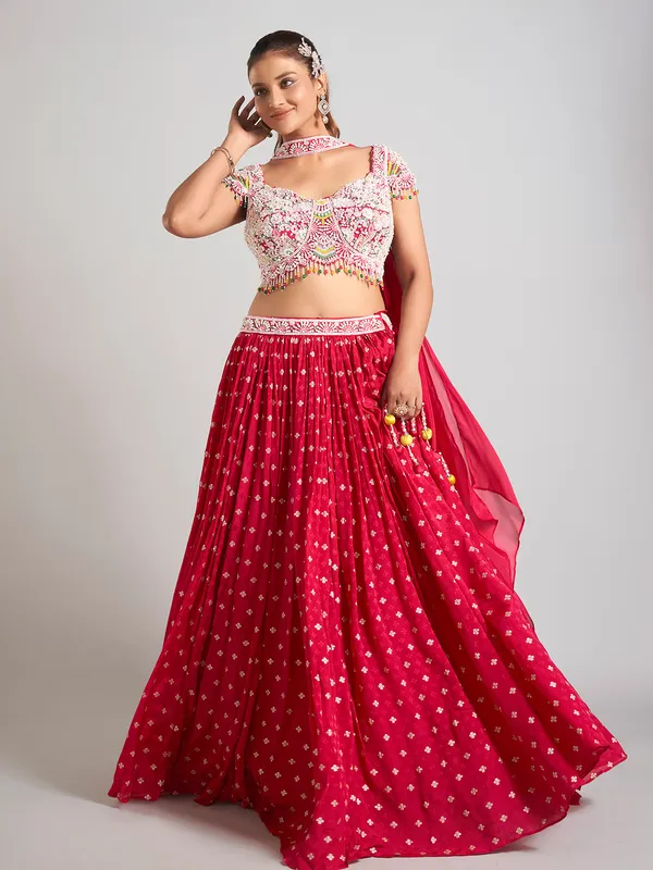 Rani color silk pearl embellished lehenga choli
