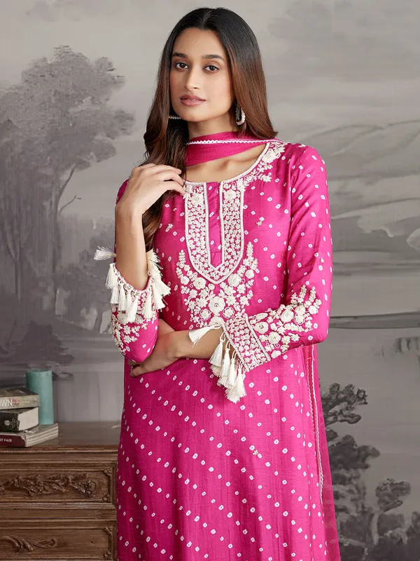 Rani color silk printed salwar suit with dupatta