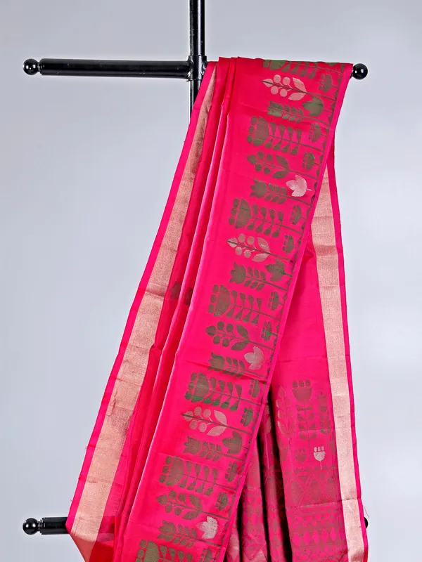 Rani color silk saree with zari highlights