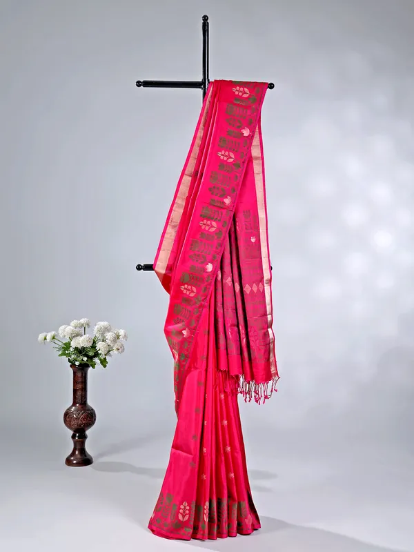 Rani color silk saree with zari highlights