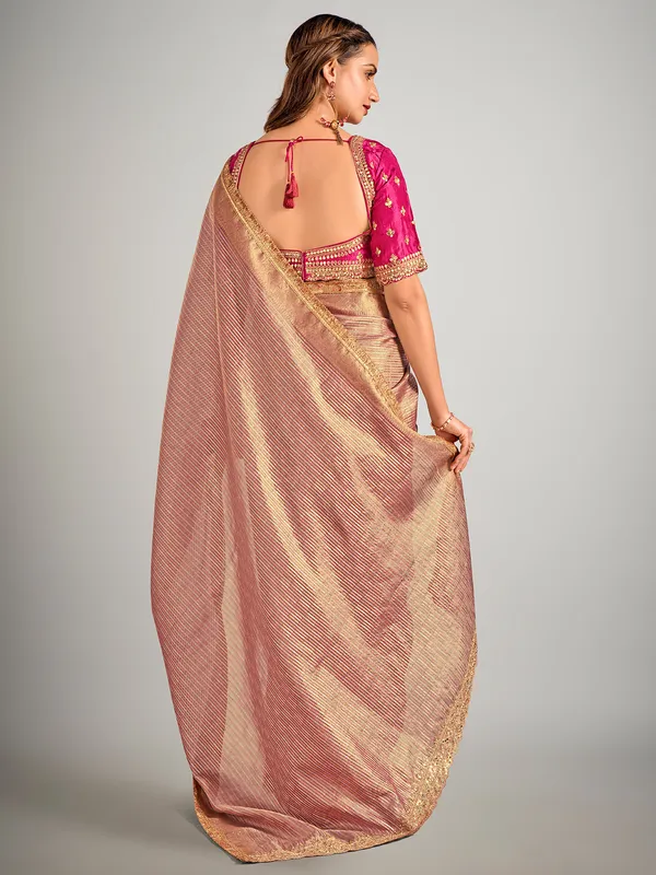 Rani color tissue silk zari weaving saree