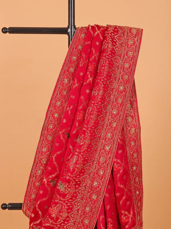 Rani color zari worked wedding saree in dola silk