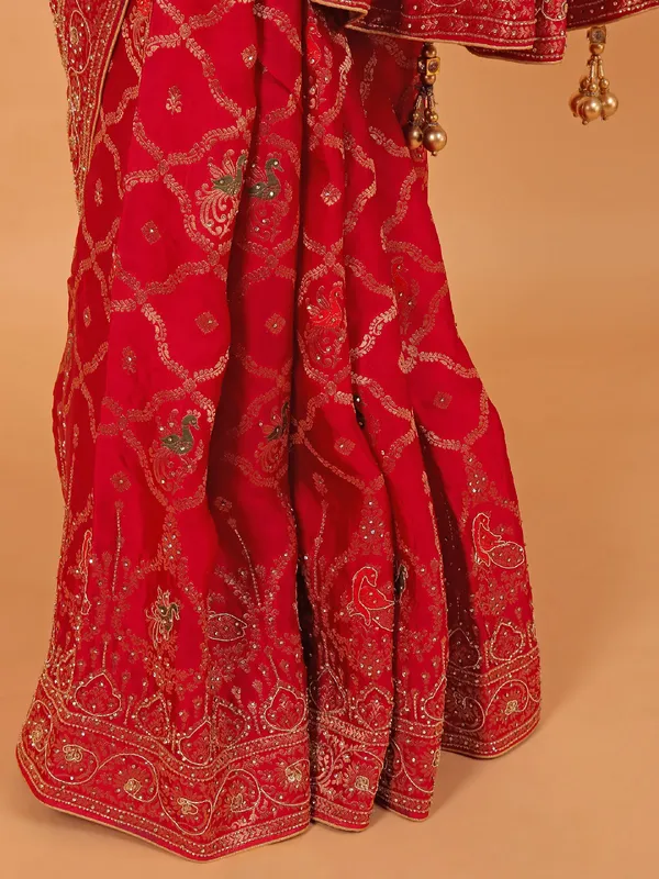 Rani color zari worked wedding saree in dola silk
