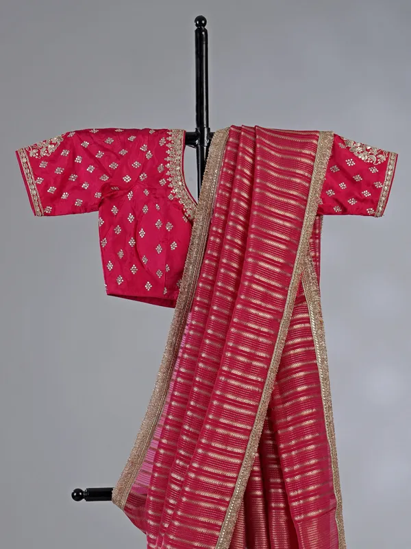 Rani organza saree with ready made blouse