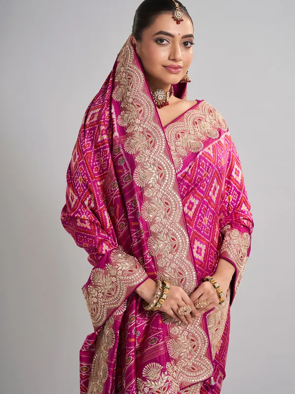 Rani patola silk saree with heavy zari work for weddings