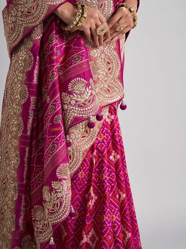 Rani patola silk saree with heavy zari work for weddings