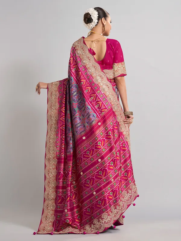 Rani pink and purple patola silk saree for wedding occasions