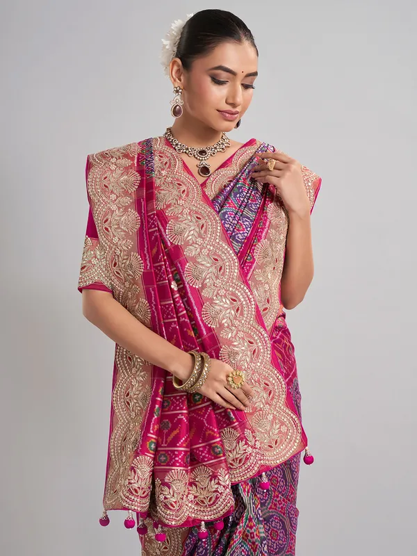 Rani pink and purple patola silk saree for wedding occasions