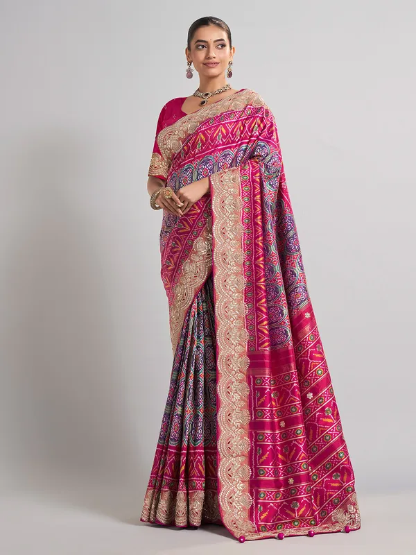 Rani pink and purple patola silk saree for wedding occasions