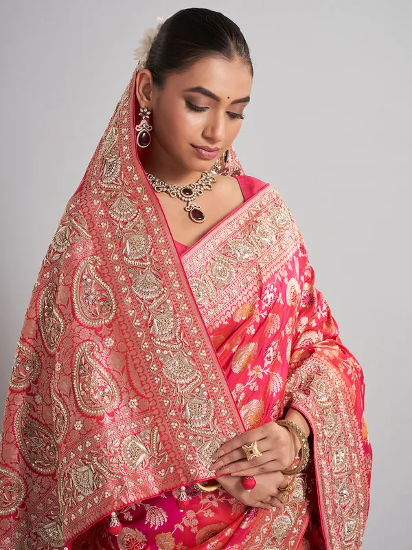 Rani pink banarasi silk saree with intricate zari accents