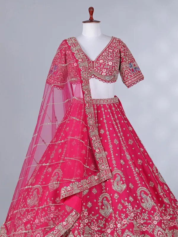 Rani pink bridal lehenga choli in raw silk