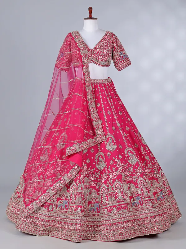 Rani pink bridal lehenga choli in raw silk