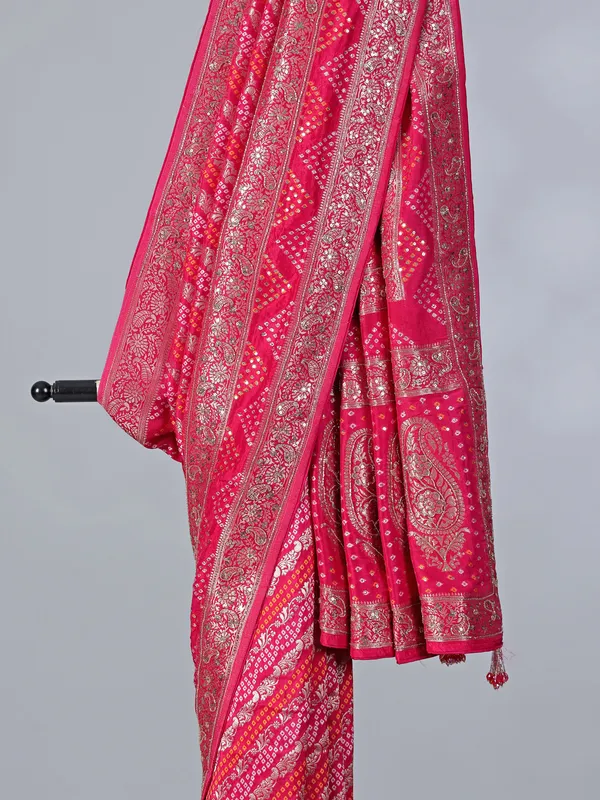Rani pink dola silk saree with bandhej print accents